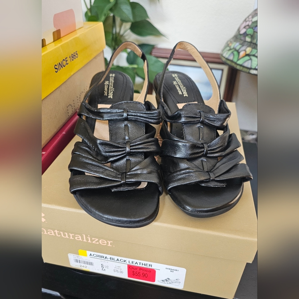 New in box. Black leather "naturalizer" brand sandals size 8 1/2. I'll be listin